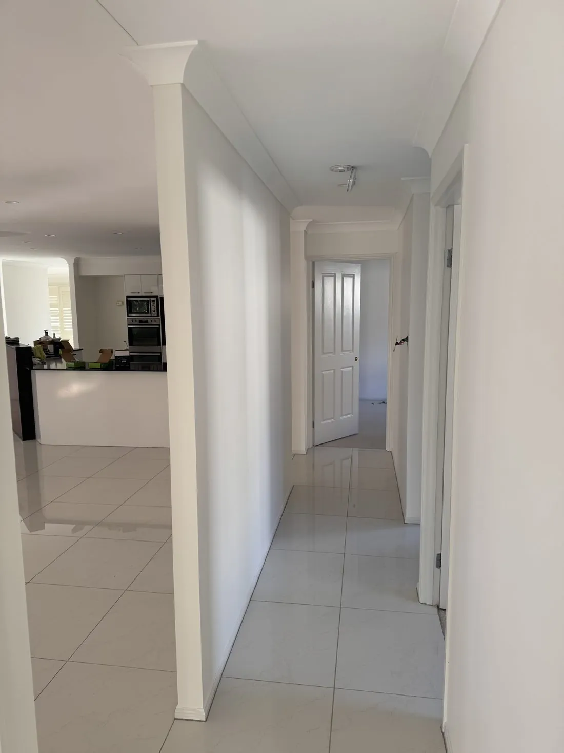 Crisp white hallway repaint at Coolangatta