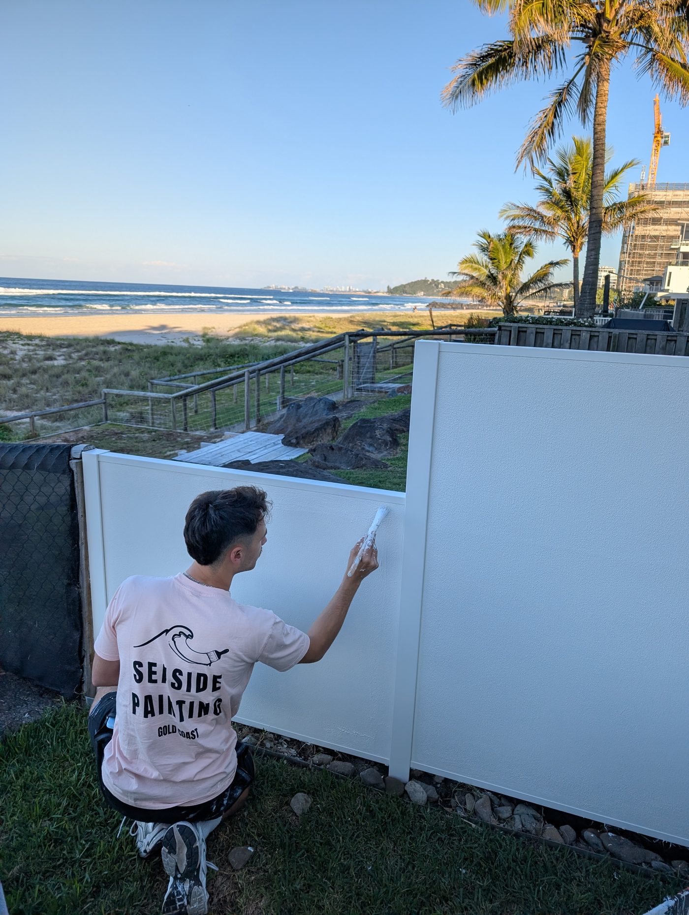 The Seaside Painting crew cutting in and rolling on a job