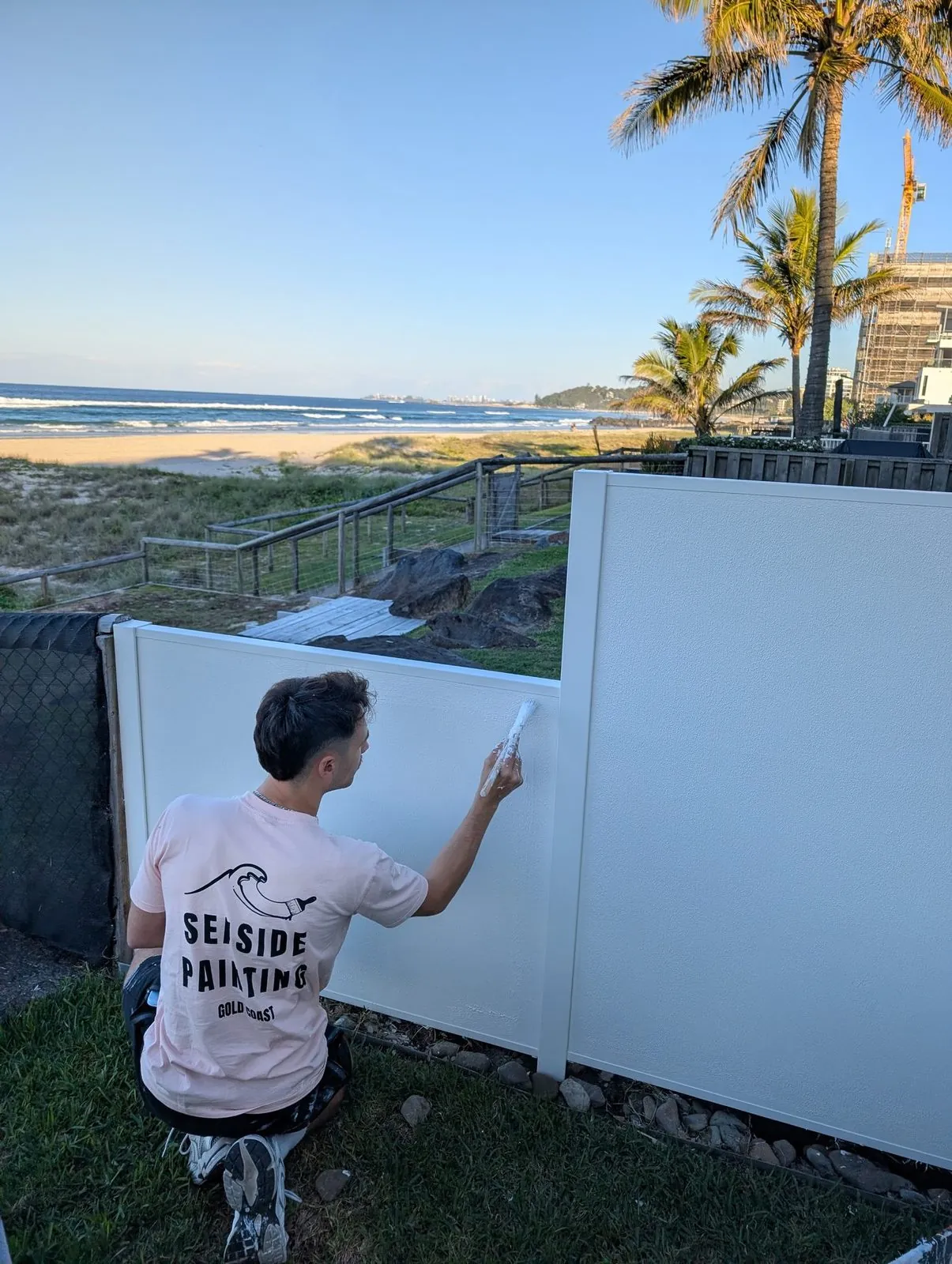 The Seaside Painting crew cutting in and rolling on a job