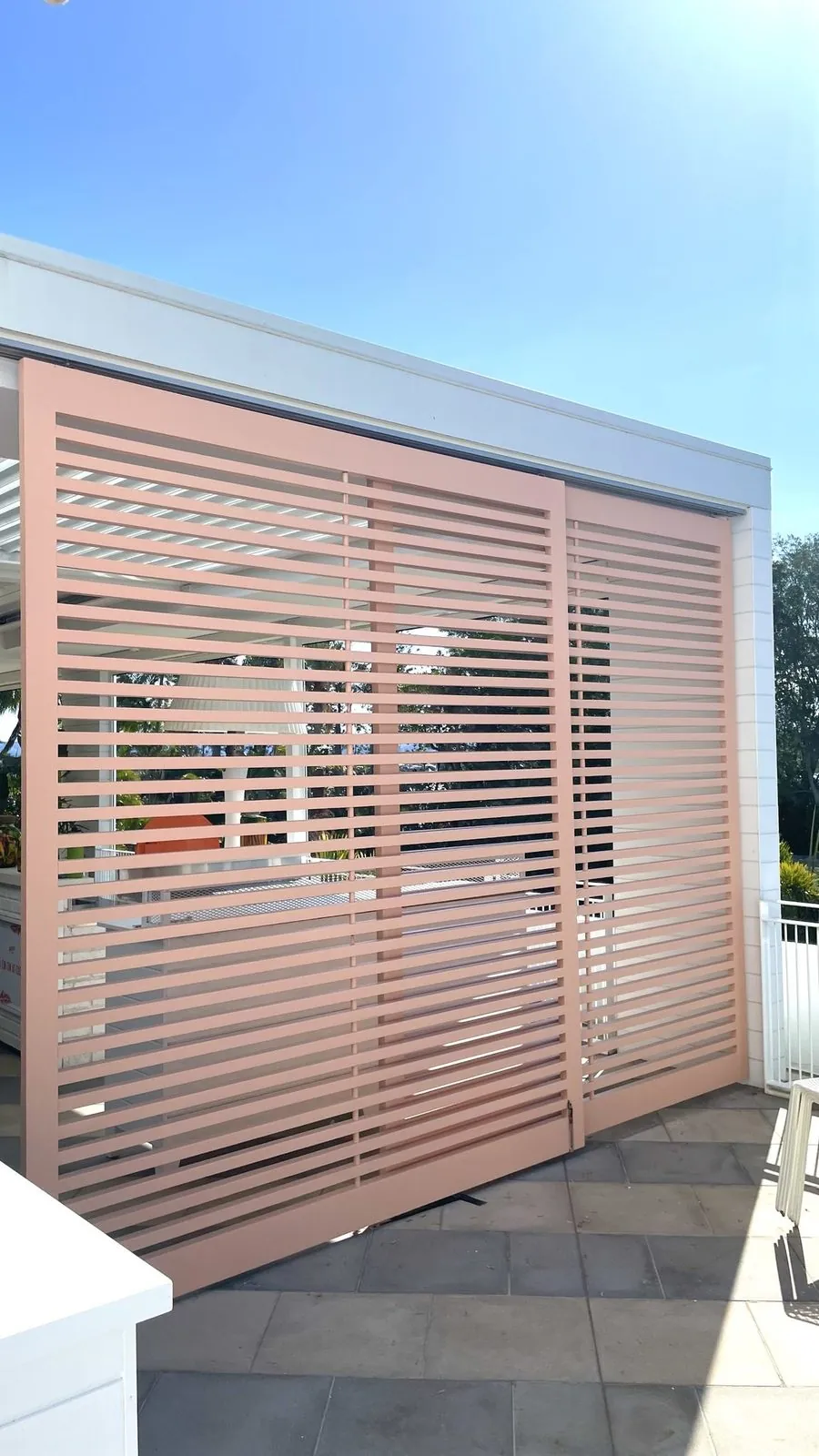 Freshly painted timber privacy screen on a deck at Burleigh Heads